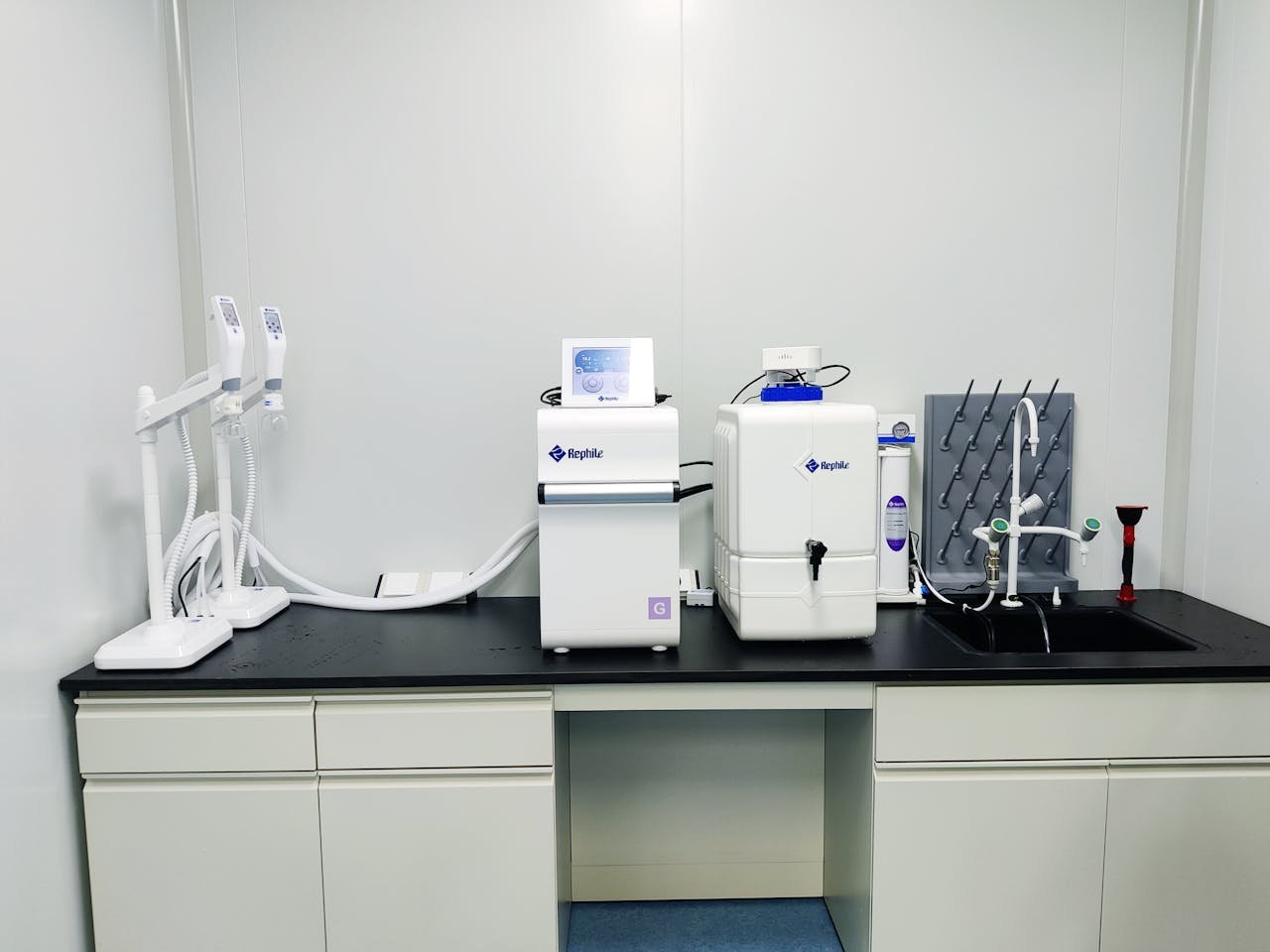 High-tech water purification system set up in a laboratory environment.